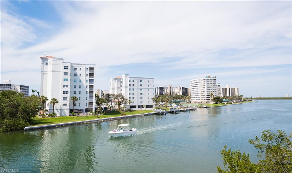 699 110th Avenue North, Unit A Naples, FL 34108 - Photo 15 of 15 a view of a city with tall buildings