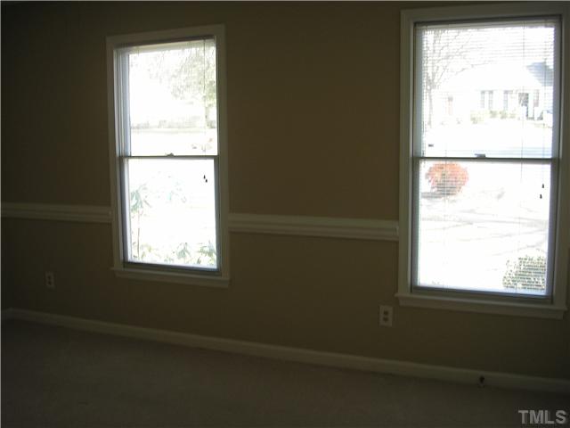 2654 Cottage Circle Raleigh, NC 27613 - Photo 11 of 17 a view of an empty room and a window