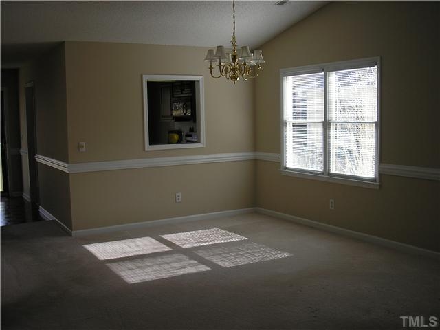 2654 Cottage Circle Raleigh, NC 27613 - Photo 5 of 17 a view of an empty room with a window