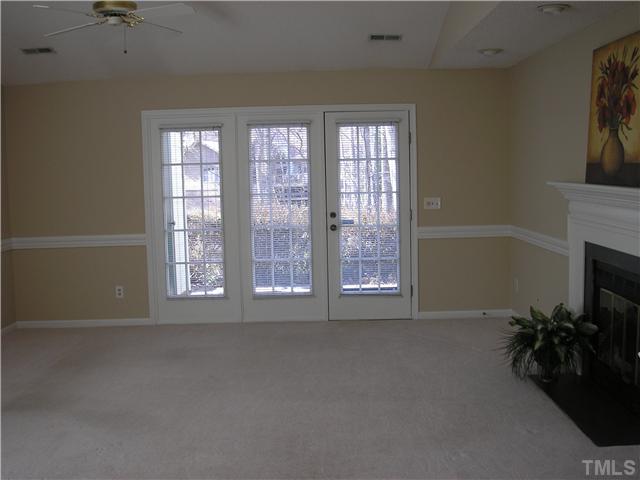 2654 Cottage Circle Raleigh, NC 27613 - Photo 7 of 17 an empty room with windows