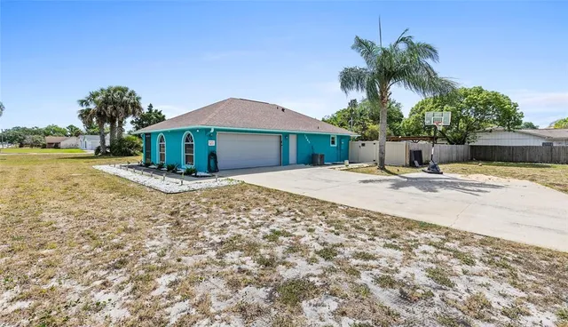 a view of a house with outdoor space and sitting area