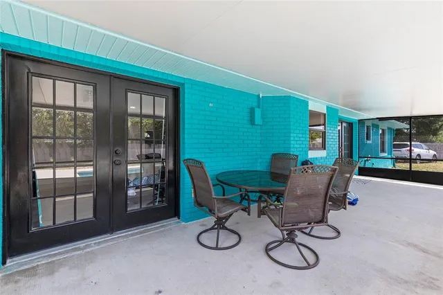 a view of a livingroom with furniture and windows
