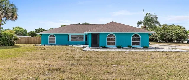 front view of a house with a yard