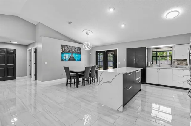 a living room with furniture and a table