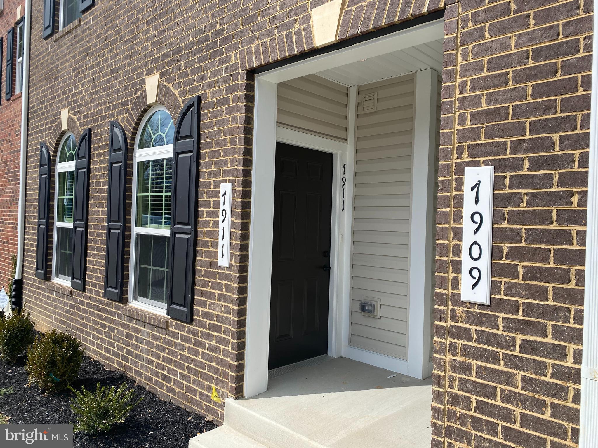 7911 Independence Drive, Unit 1C Spotsylvania, VA 22553 - Photo 2 of 35 a view of front door of house