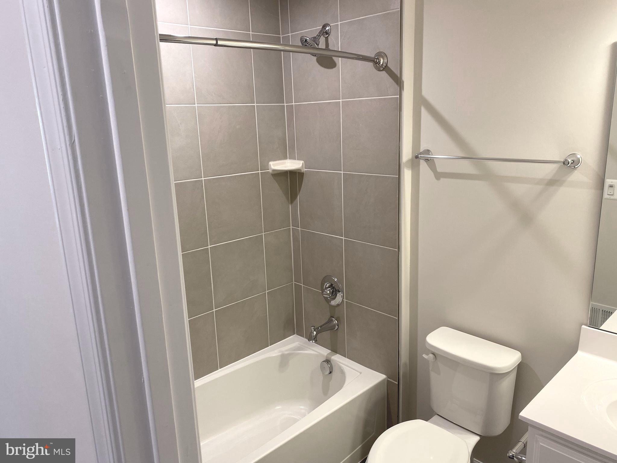 7911 Independence Drive, Unit 1C Spotsylvania, VA 22553 - Photo 26 of 35 a view of a bathroom with a sink and toilet
