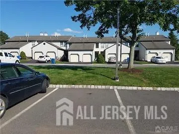 a view of swimming pool with a yard