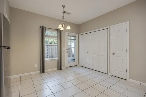 a kitchen with a refrigerator a sink and dishwasher