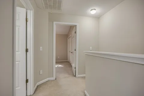 a bathroom with a shower and a bath tub