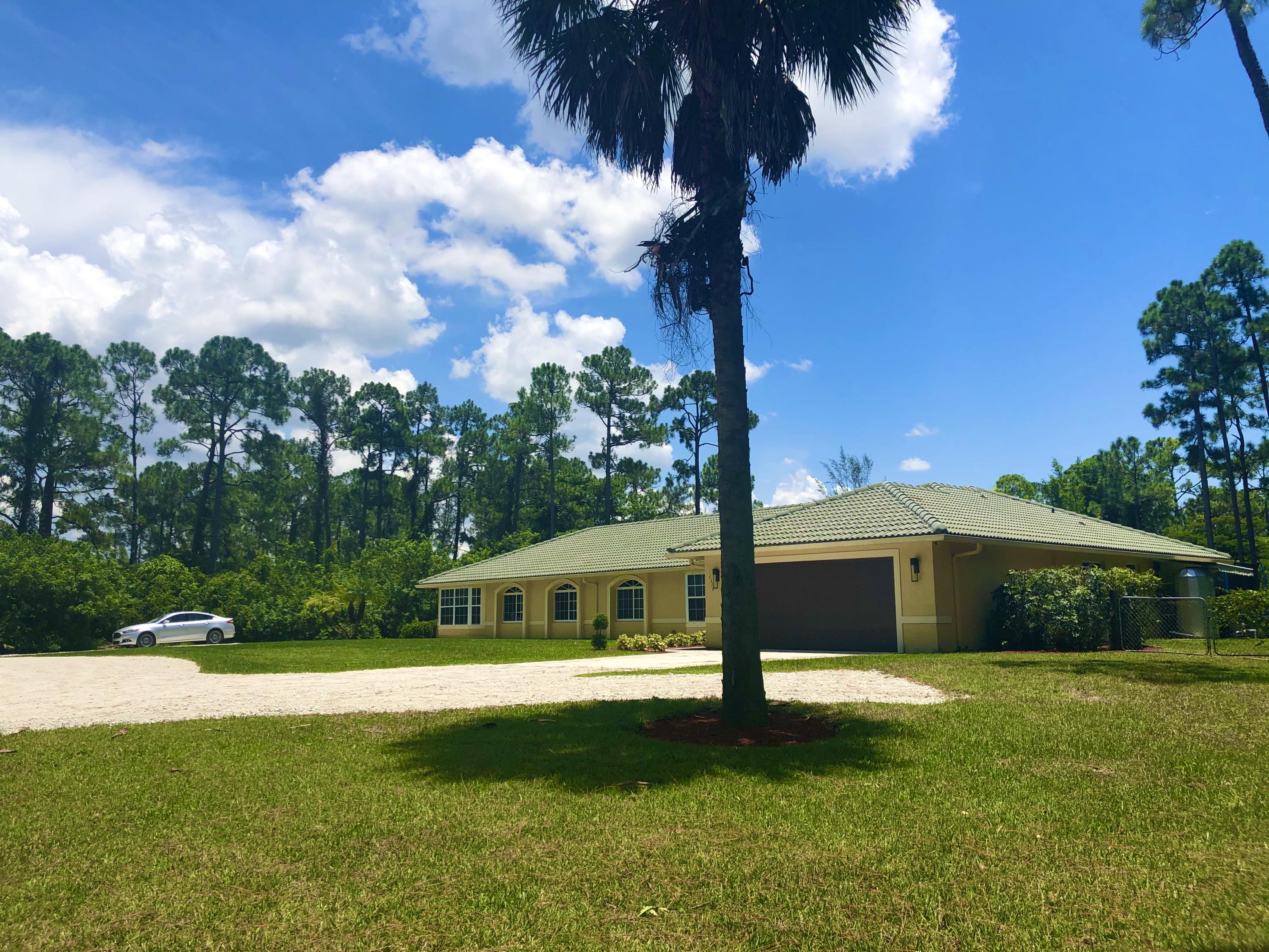 16370 88th Road North Loxahatchee, FL 33470 - Photo 9 of 161 BFD6272A-F3F3-4DB0-9841-8069D77B41CF