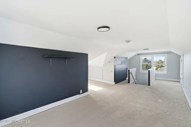 a view of a livingroom with furniture and cabinet