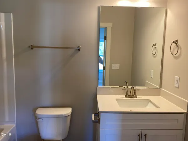 a bathroom with a sink and a toilet