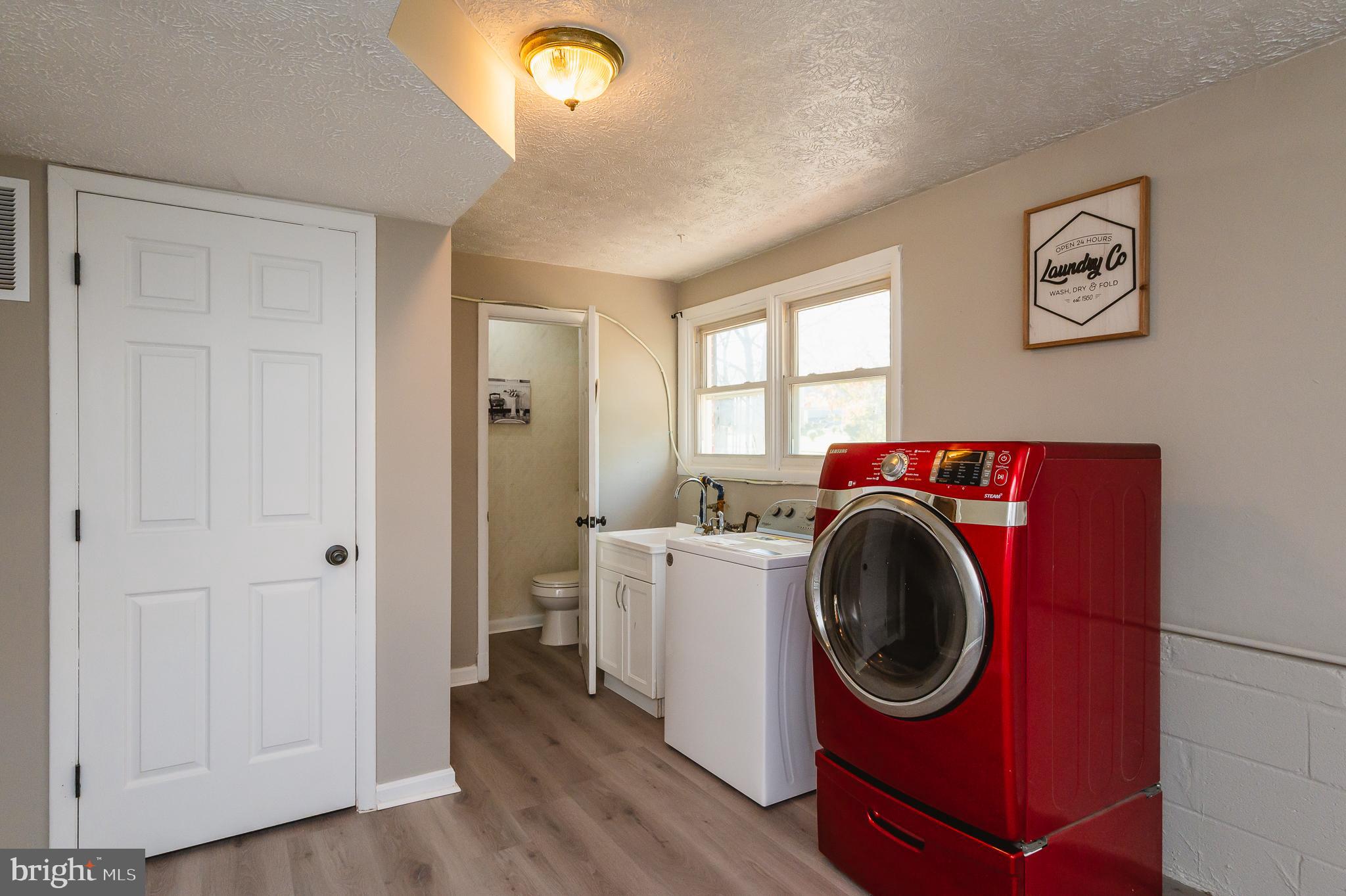 1305 Charmuth Road Lutherville-Timonium, MD 21093 - Photo 9 of 52 Laundry/half bath