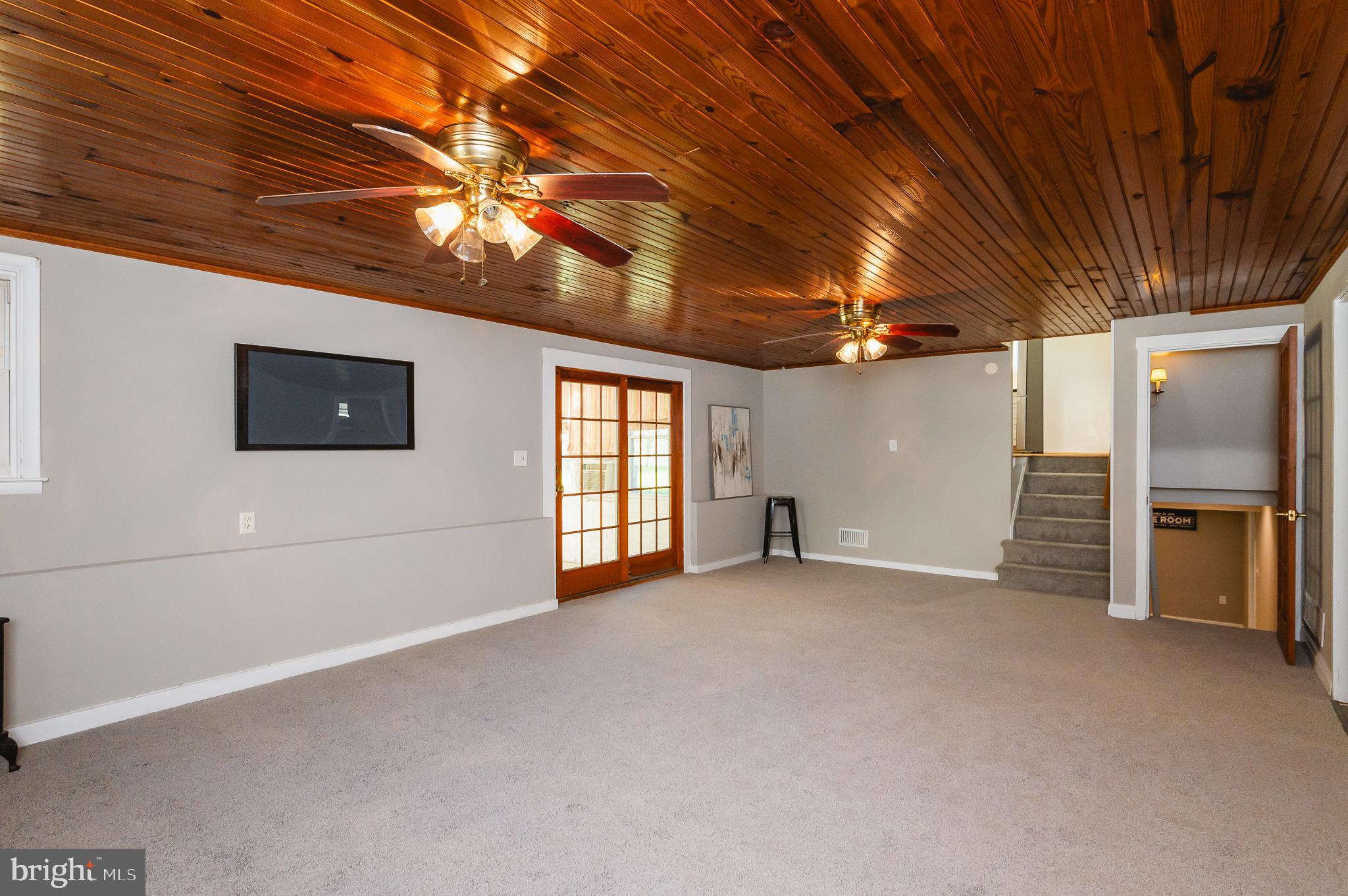 1305 Charmuth Road Lutherville-Timonium, MD 21093 - Photo 10 of 52 Family room opens to sunporch