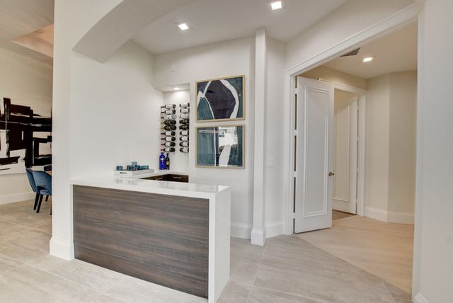 a living room with patio furniture