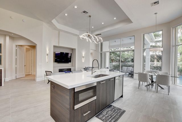 an aerial view of lake residential house with outdoor space and river