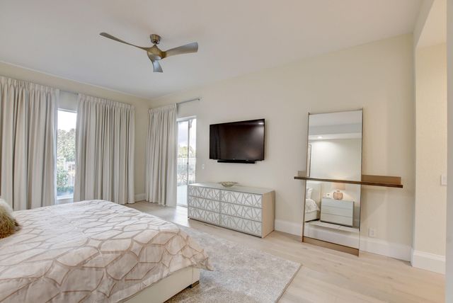 a view of a chairs and tables in patio