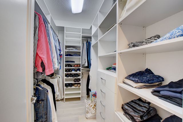 an aerial view of residential house with outdoor space and swimming pool