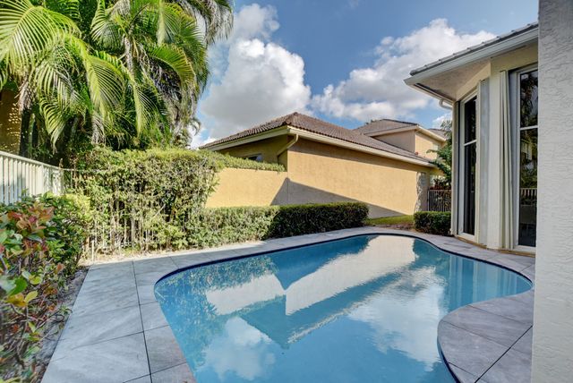 a bathroom with a shower and a sink