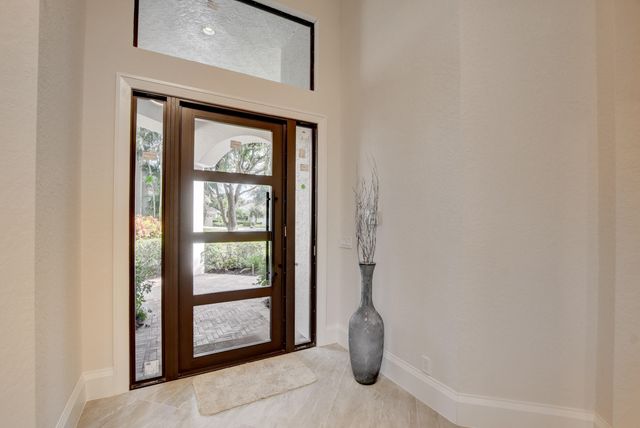 a bedroom with a bed and a night lamp