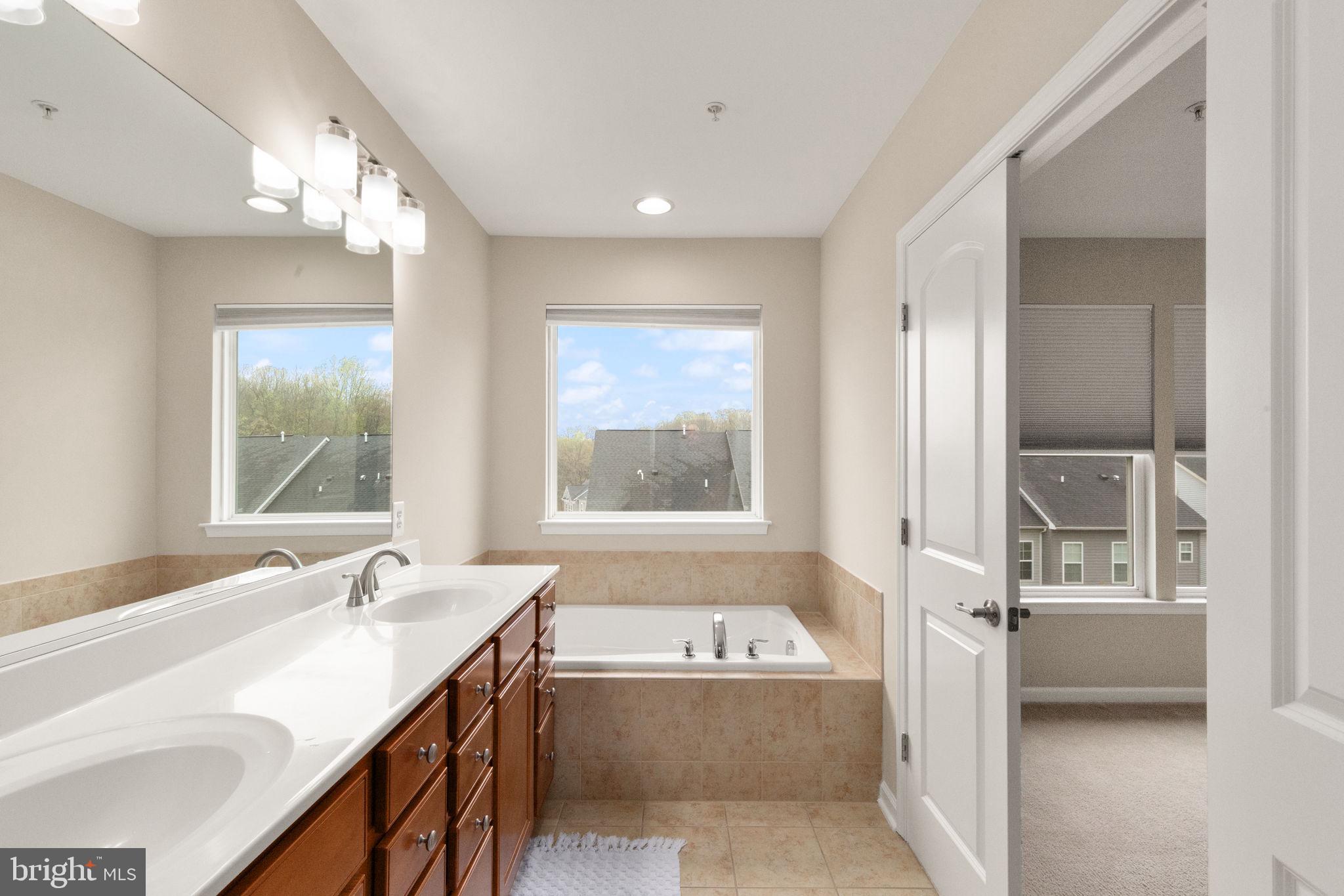 7825 Crystal Brook Way Hanover, MD 21076 - Photo 20 of 34 Primary Bedroom En-Suite