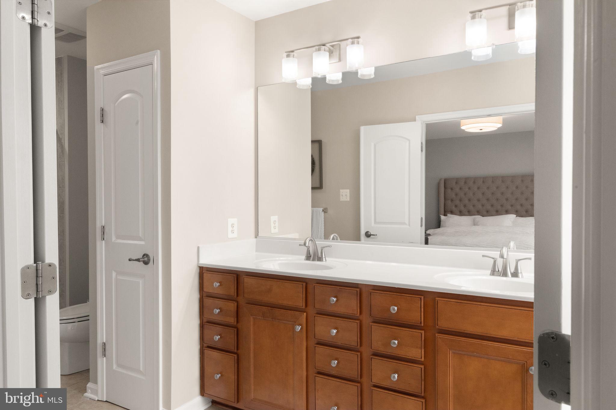 7825 Crystal Brook Way Hanover, MD 21076 - Photo 21 of 34 Primary Bedroom En-Suite