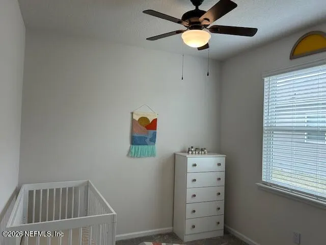 a view of a hallway with workspace