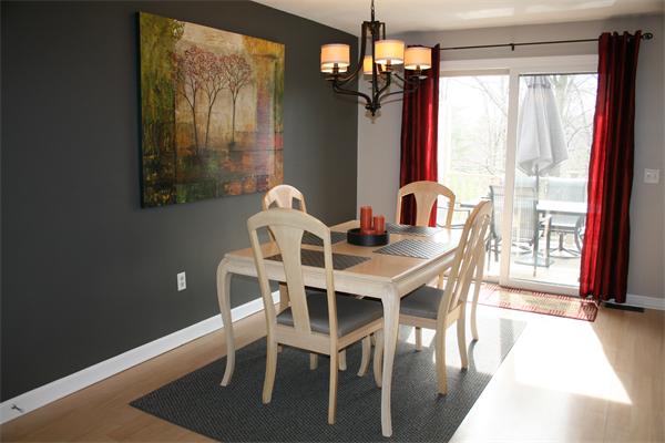 8 Apple Ridge Road, Unit 6 Maynard, MA 01754 - Photo 11 of 30 a view of a dining room with furniture window and outside view