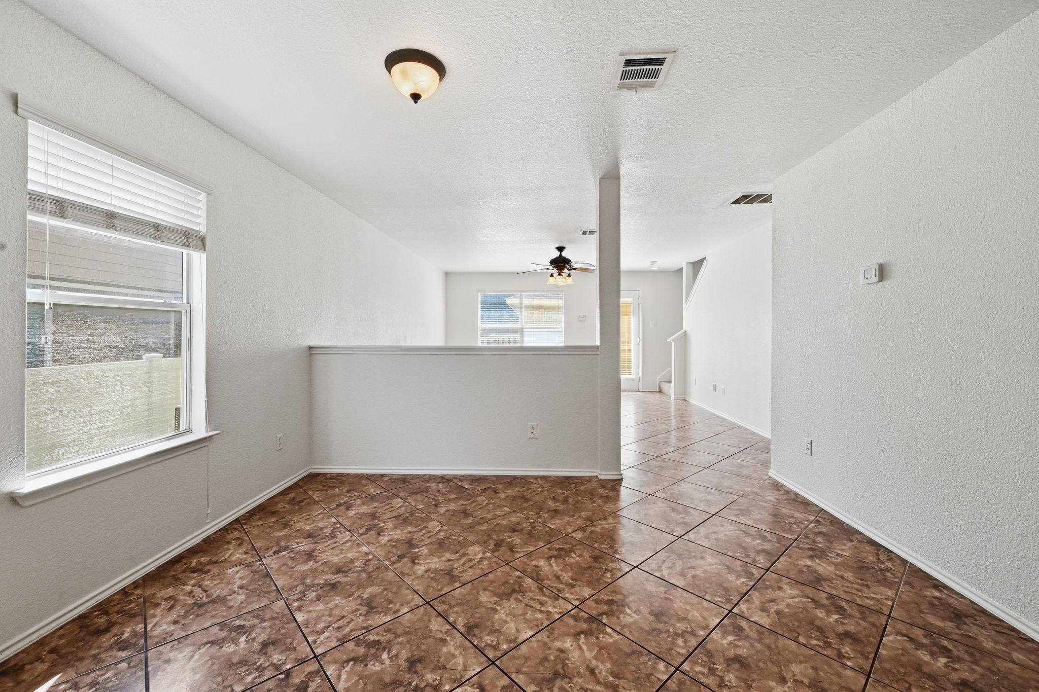 1805 Lost Maples Loop Cedar Park, TX 78613 - Photo 11 of 31 a view of a hallway view with wooden floor and a cabinet