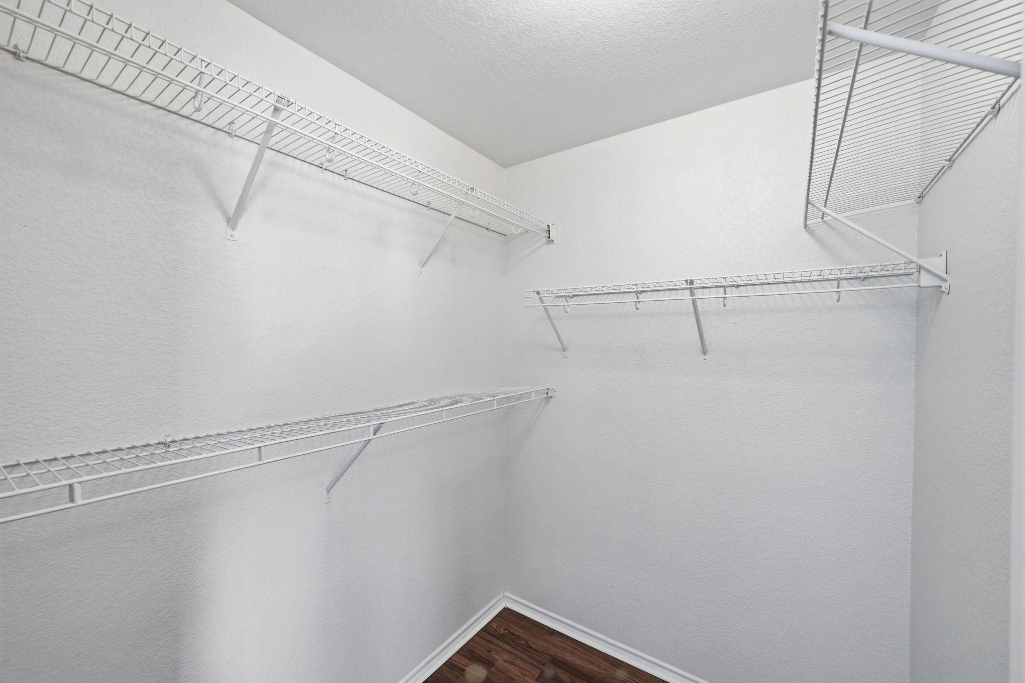 1805 Lost Maples Loop Cedar Park, TX 78613 - Photo 19 of 31 a view of a room with racks on the wall