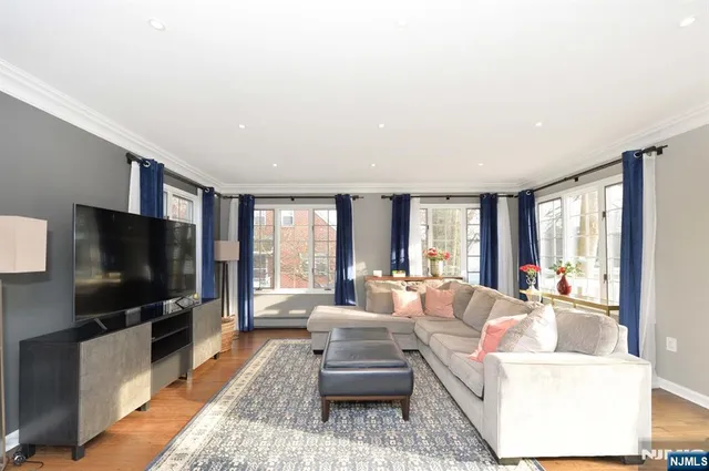 a room with furniture and a wooden floor