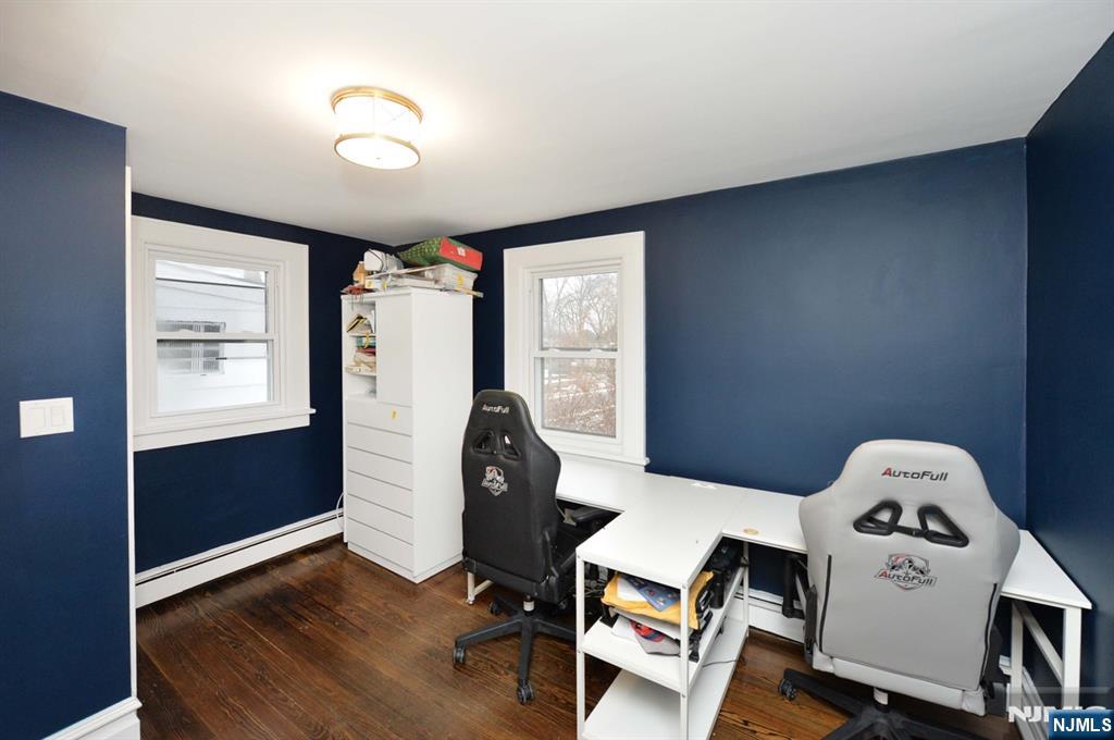 675 Center Street Oradell, NJ 07649 - Photo 22 of 29 a living room with furniture and a window