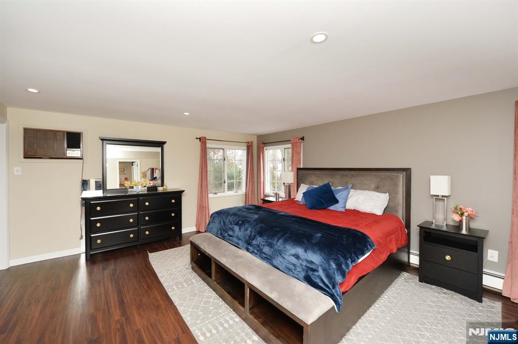 675 Center Street Oradell, NJ 07649 - Photo 24 of 29 a bedroom with a bed and a dresser