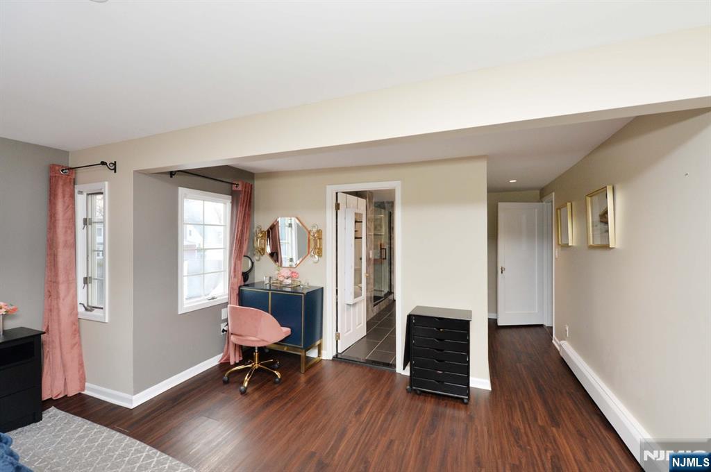 675 Center Street Oradell, NJ 07649 - Photo 25 of 29 a living room with furniture and a wooden floor
