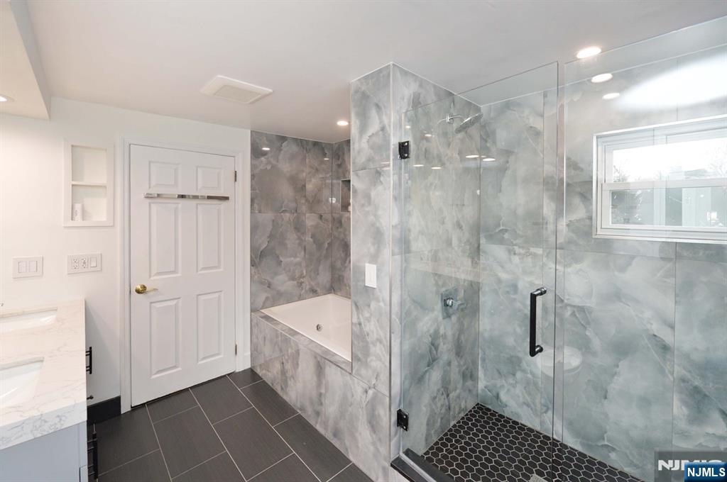 675 Center Street Oradell, NJ 07649 - Photo 27 of 29 a bathroom with a shower