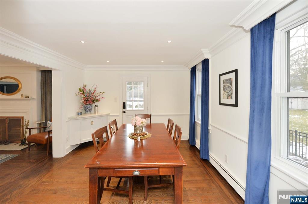 675 Center Street Oradell, NJ 07649 - Photo 8 of 29 a view of a dining room with furniture window and wooden floor