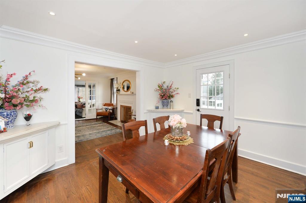675 Center Street Oradell, NJ 07649 - Photo 9 of 29 a view of a dining room with furniture and wooden floor