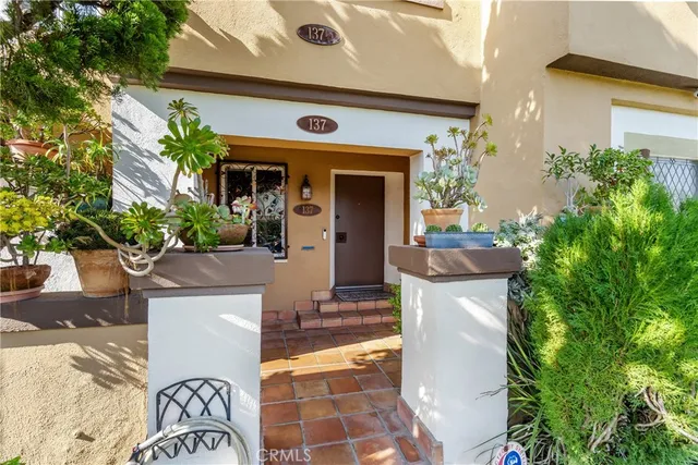 a front view of a house with a porch