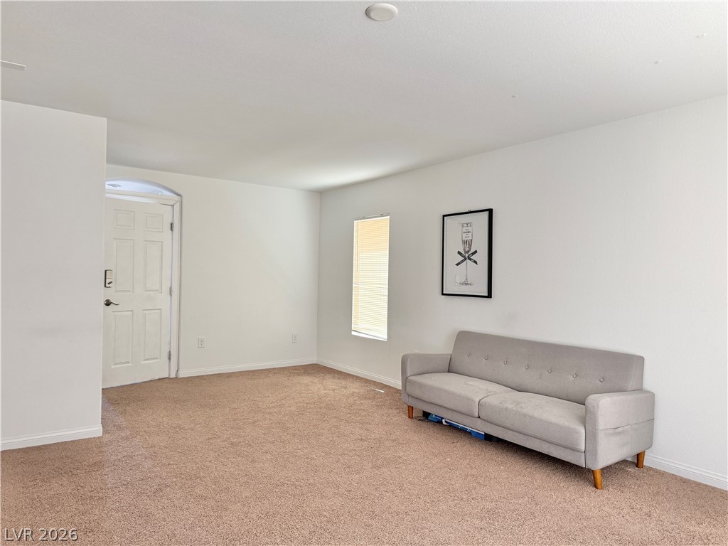 7777 South Westwind Road Las Vegas, NV 89139 - Photo 5 of 46 A welcoming interior entrance flows seamlessly into a comfortable living area.