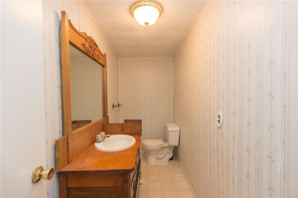 935 Chapel Road Beaver, PA 15009 - Photo 13 of 19 half bath in gamer room.