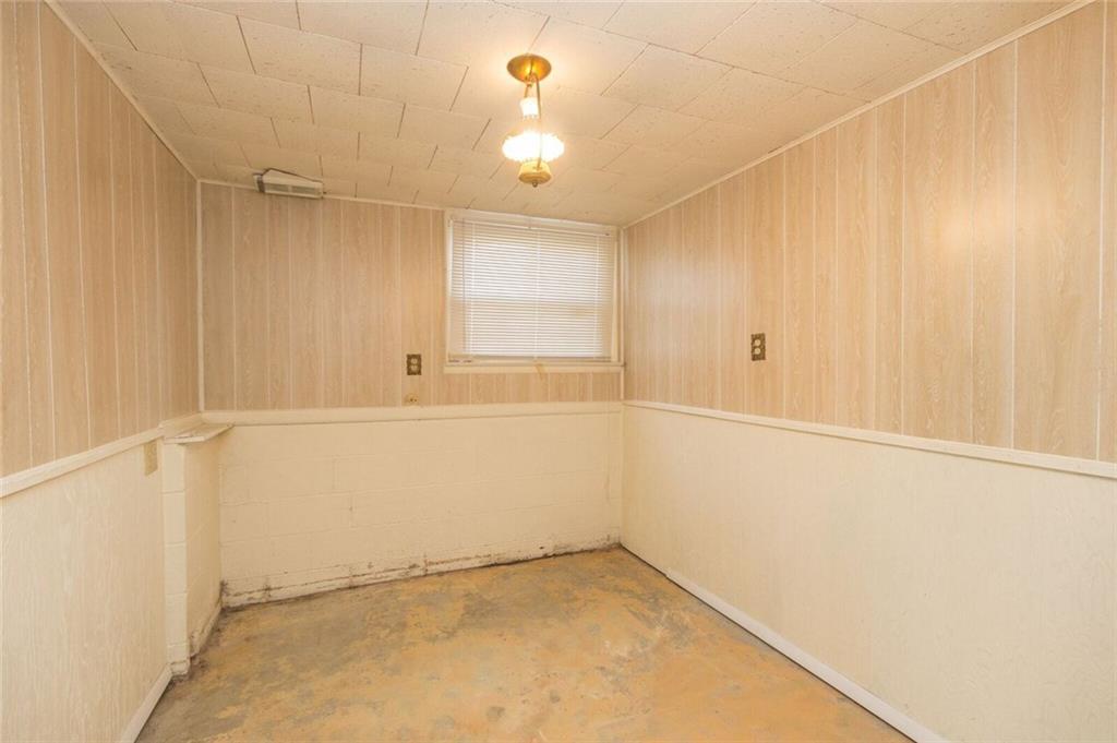 935 Chapel Road Beaver, PA 15009 - Photo 14 of 19 den /office in lower level needs new flooring