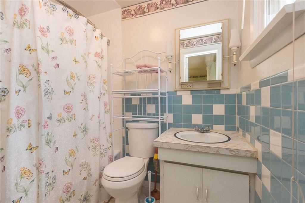 935 Chapel Road Beaver, PA 15009 - Photo 10 of 19 master bath with tub/shower/ vinyl flooring /