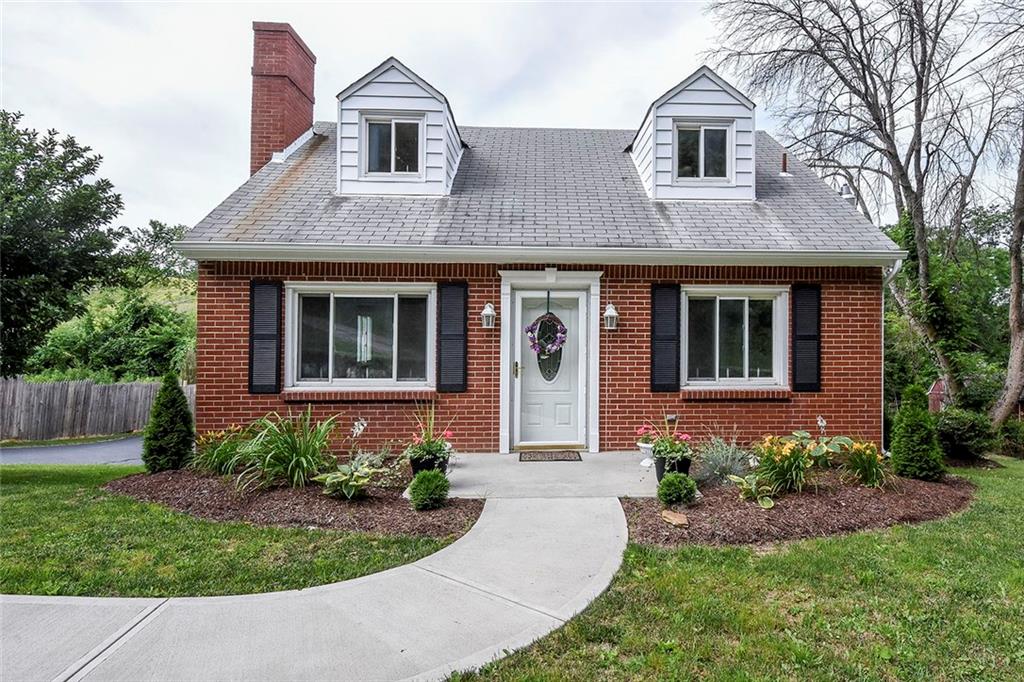1009 Arona Road New Stanton, PA 15672 - Photo 1 of 24 The new sidewalk, new windows, new door and fresh landscaping create great curb appeal!