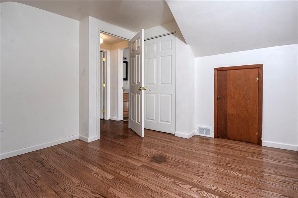 1009 Arona Road New Stanton, PA 15672 - Photo 14 of 24 3rd bedroom has storage area as well as closet. Again new windows and refinished floors. New Doors throughout the home...