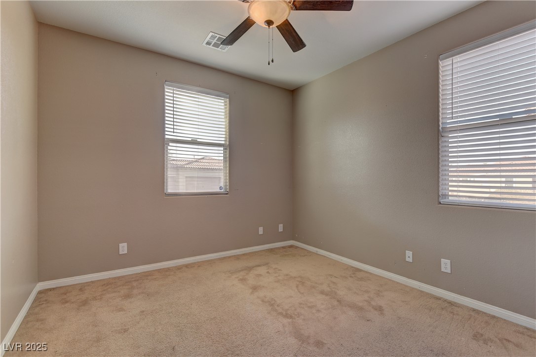 972 Rue Grand Paradis Lane Henderson, NV 89011 - Photo 21 of 32 Spare room with carpet floors and ceiling fan