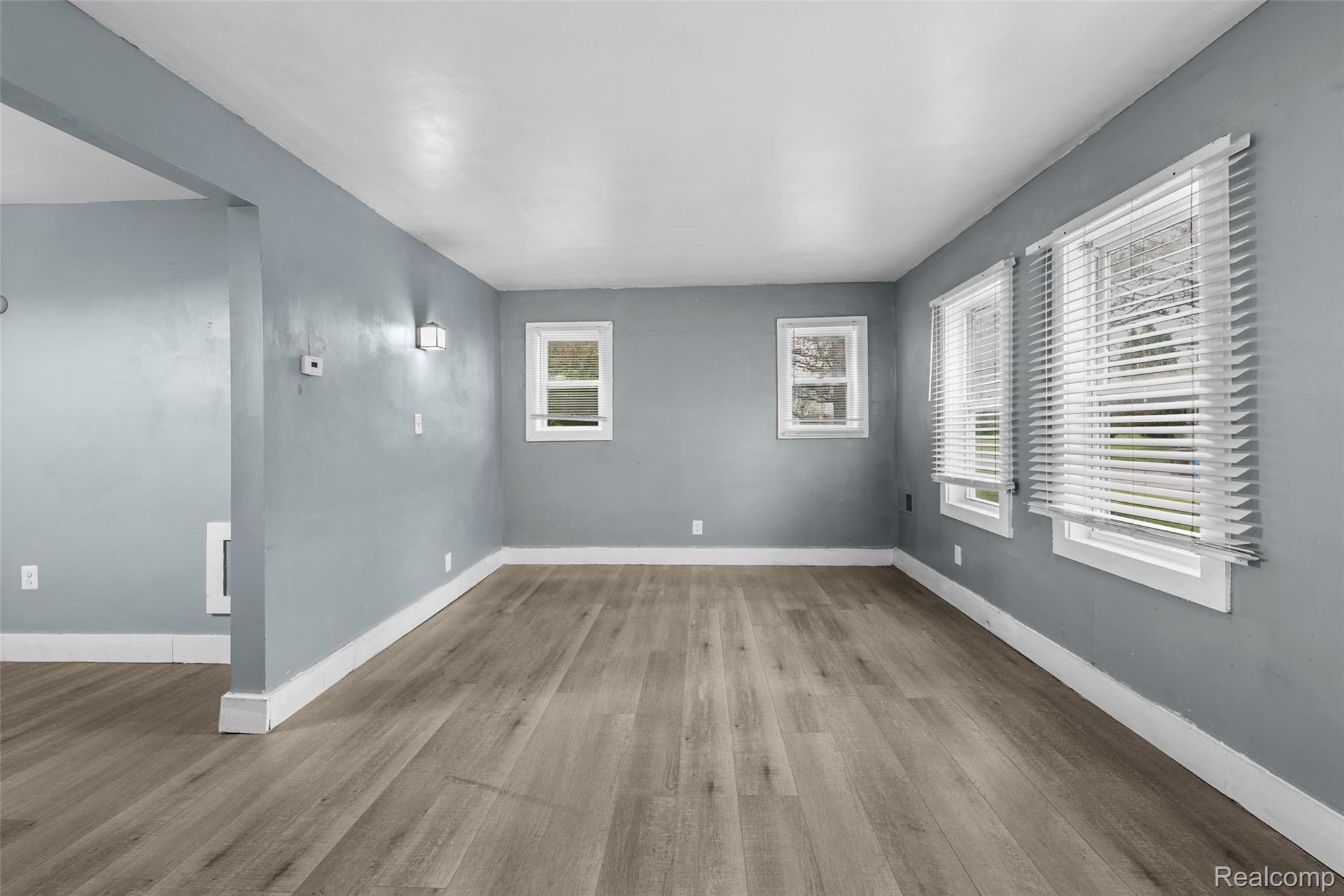 3605 Ash Street Inkster, MI 48141 - Photo 6 of 25 Spare room with light wood-type flooring and baseboards