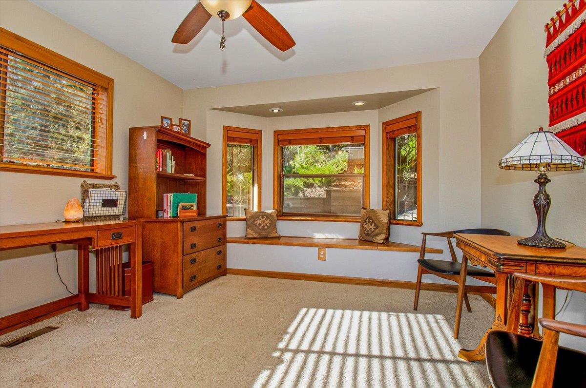 5617 Indian Hills Road Murphys, CA 95247 - Photo 19 of 80 a very nice looking dining room with a large window and a wooden table