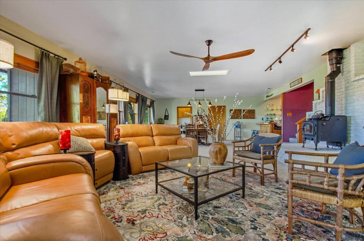 5617 Indian Hills Road Murphys, CA 95247 - Photo 21 of 80 a living room with furniture and a flat screen tv
