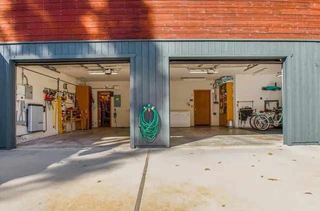 a patio with yard glass top table and chairs