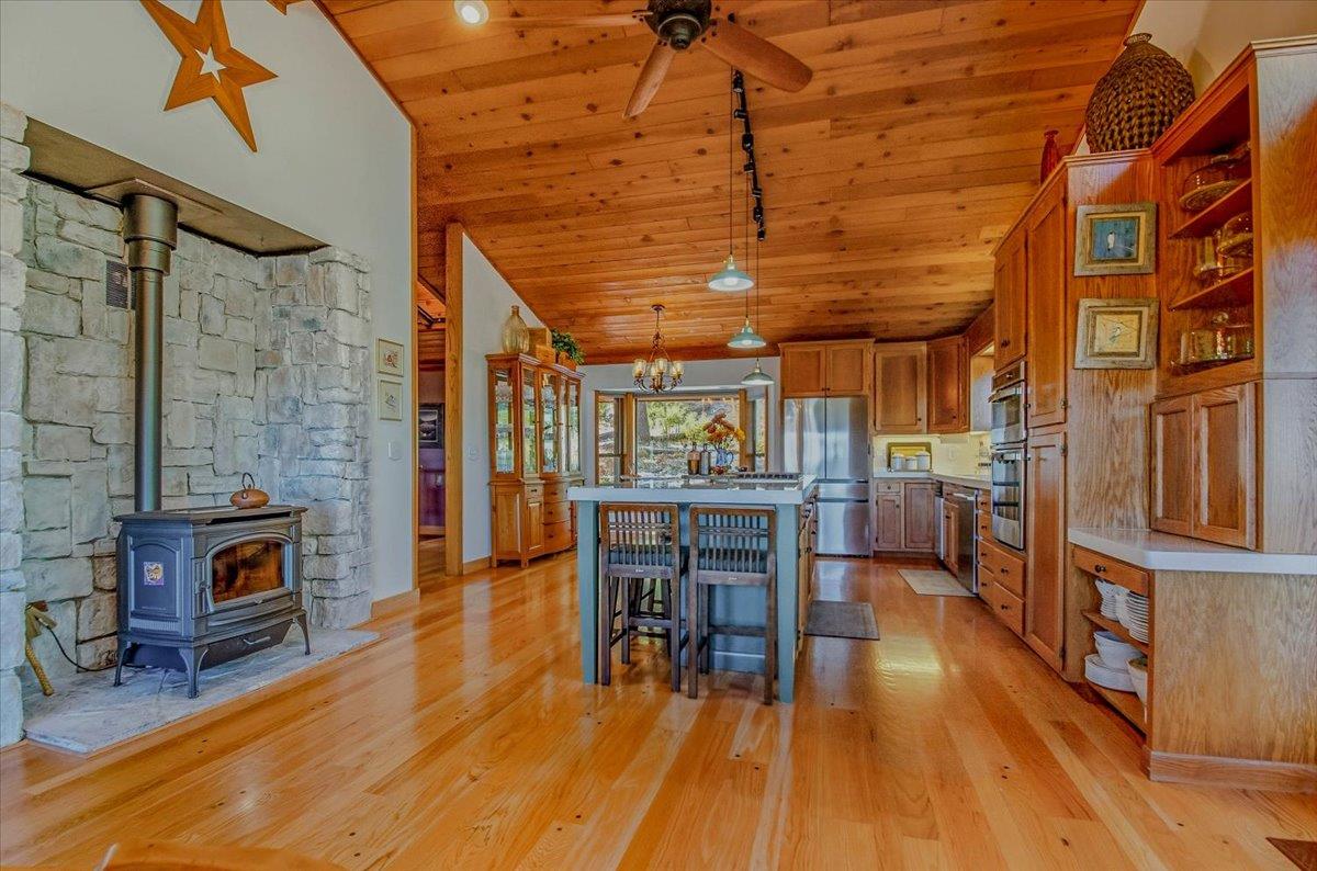 5617 Indian Hills Road Murphys, CA 95247 - Photo 5 of 80 a dining room with furniture and wooden floor
